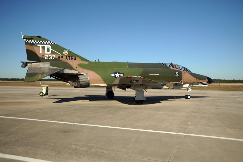 GD DSC_4306.JPG - QF-4E, serial # 71-0237, wears markings for the Commander of the 82nd Aerial Targets Squadron (ATRS) along with a high-gloss Southeast Asia paint scheme from the Vietnam-era. This aircraft is configured as a drone but often attends airshows as part of the USAF's popular 'Heritage Flight' program. Heritage Flight puts important aircraft types in formation together to show the USAF lineage and combat heritage. The F-4 Phantom is an important part of any Heritage Flight display. QF-4E Drones are assigned to the 82nd ATRS, 53rd Weapons Evaluation Group (WEG) and fall under the USAF's warfighting command--Air Combat Command.  Photographed on 17 Nov. 2008.  © 2008 Greg L. Davis, Aviation Photojournalist  www.focalplaneimagery.com